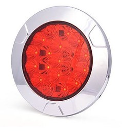 Runde rote Heckleuchte im Wabendesign mit LEDs und chromfarbenem Rand.