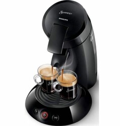 Schwarze Senseo Philips Kaffeepadmaschine, die Kaffeetassen befllt.