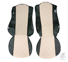 Ein Paar creme-schwarze Kunstleder-Sitzbezge mit gewaffeltem Mittelteil fr LKW.