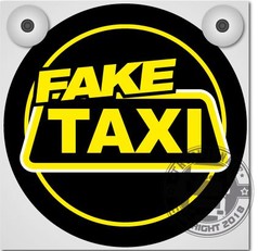 Schwarze runde Platte fr Leuchtkasten mit gelbem "FAKE TAXI" Schriftzug.