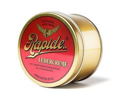 Goldene Dose Rapide Lederfett mit rotem Etikett und goldenem Schriftzug fr Lederpflege.