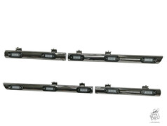 Vier glnzende, silberne Spoilerrohre mit eingebauten LED-Leuchten, hinten abgeschrgt.