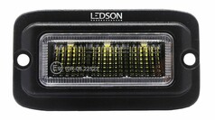 Schwarzer Ledson Raptor LED-Einbau Rckfahr-/Arbeitsscheinwerfer mit klarem Glas und gelben LEDs.