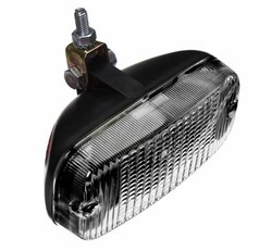 Tagfahrlicht Schwedenleuchte Talmu mit dunklem Gehuse, klarem, geripptem Glas und Montagebgel.