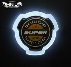 Beleuchtetes LKW-Emblem mit weier LED-Platte und dem Motiv "The Legendary Super Charged Diesel".