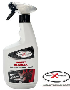 Weie Sprhflasche Pro Xtreme Wheel Bleeding Felgenreiniger mit schwarzem Etikett und Felgenbild.