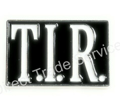 Schwarzer TIR Pin mit weien, erhabenen Buchstaben, silbernem Rand und zwei Befestigungslchern.
