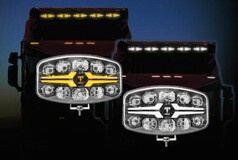 LED Fernscheinwerfer mit klarer Linse, Positionslicht in Gelb und Wei, an LKW montiert.