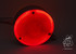 Groe, runde, rot leuchtende LED-Spiegelleuchte mit geriffelter Linse.