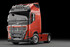 Roter Volvo FH4+5 LKW mit Trux Dachlampenbgel "Top Boge" aus Aluminium und runden Fernscheinwerfern.
